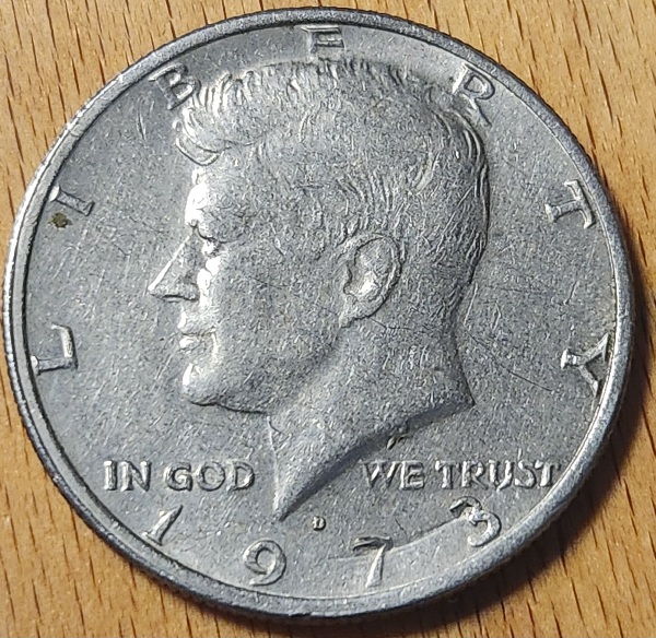 1973-Half-Dollar-PMD-Or-Ejection-Damage?