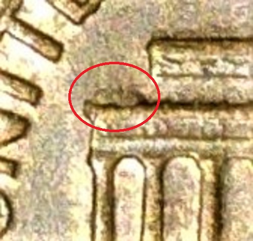 What-Is-This-Crack-Or-Line-Down-The-Back-Of-Lincolns-Neck-And-Back-On-This-1969-D-Penny?
