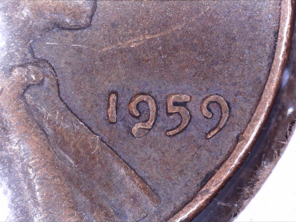 1959-Lincoln-Penny-With-A-Folded-