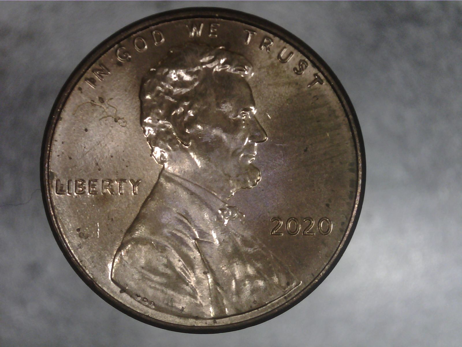 2020--LC-Struct-Thru-On-Obverse-With-2-Pieces-Of-Thread-Or-String