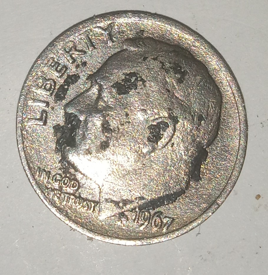1967-Dime-That-Weighs-2.00-Grams-And-Looking-At-Reeded-Edge-You-Can-See-The-Layers-