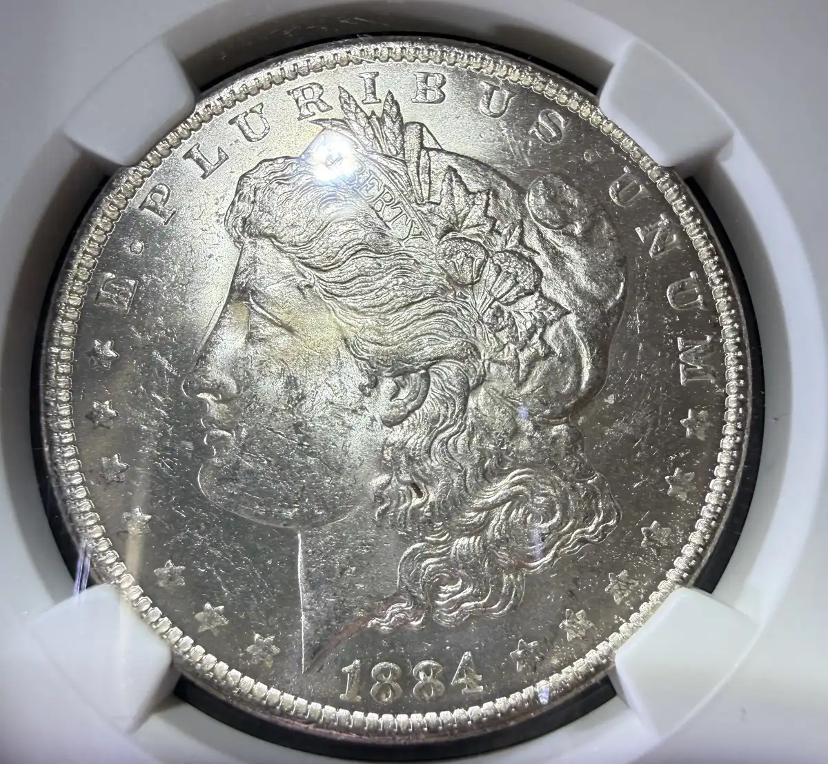 GTG-1884-O-Morgan-Dollar,-Graded-By-NGC