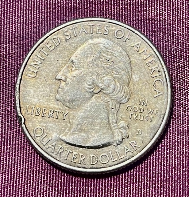 Why-Is-This-2017-D-Frederick-Douglass-Quarter-Yellow?-Is-There-A-Name-For-This?