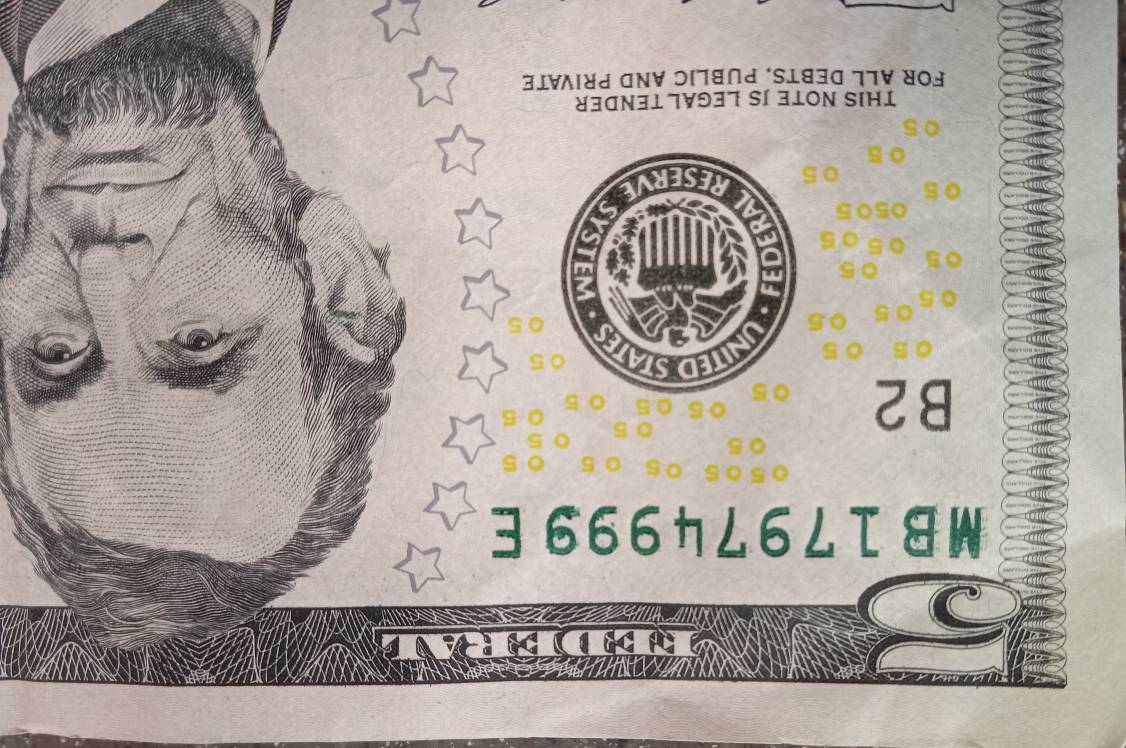 $5-2013-Bill-With-Error-In-The-Printing-Curious-On-Its-Value