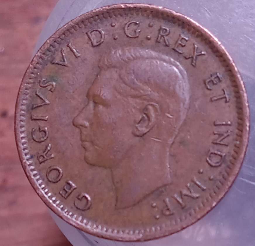 1947-Canada-1-Cent.-Minted-In-1948,-With-Sharp-7.