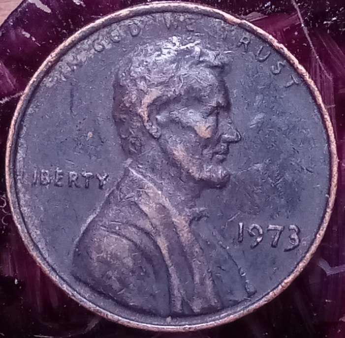1973-P-1cent.-Is-This-A-Plate-Defect?-This-Coin-Is-Also-Toned-Dark