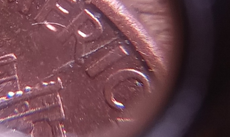 1993-P-1-Cent.-Does-It-Have-A-Die-Crack-On-The-Reverse,-At-2:30?