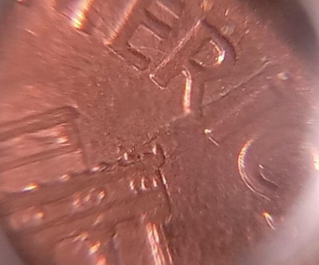 1993-P-1-Cent.-Does-It-Have-A-Die-Crack-On-The-Reverse,-At-2:30?