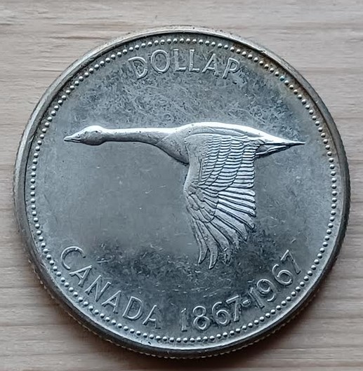 1867---1967-Canadian-Dollar-Grade?