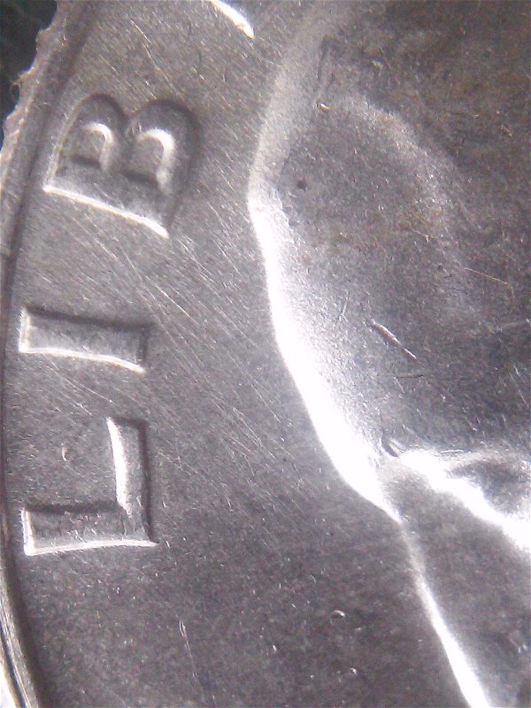 1957-D-Quarter-With-RPM-Over-Horizontal-D?