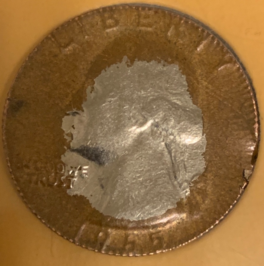 1965-Quarter-Stamped-On-A-Split-Planchet?