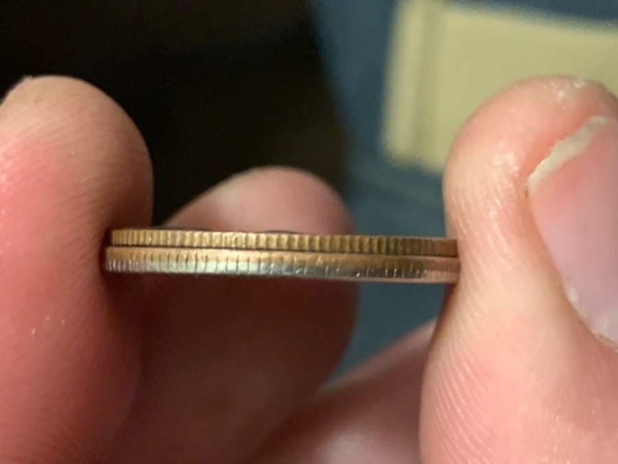 1965-Quarter-Stamped-On-A-Split-Planchet?