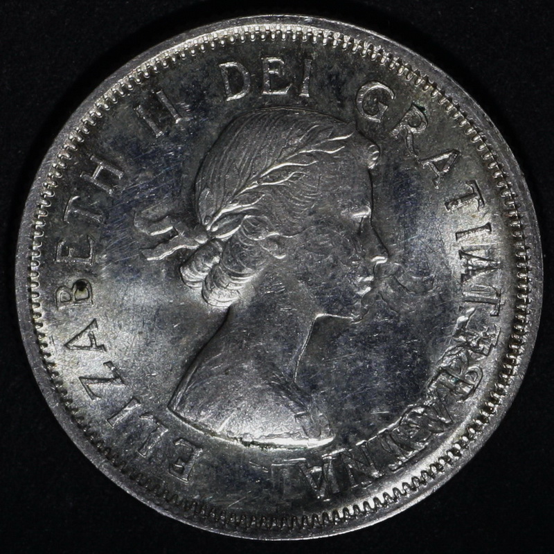 Is-This-1963-25-Cent-An-Error-Coin?-Or-A-Vise-Or-Hammer-Job?