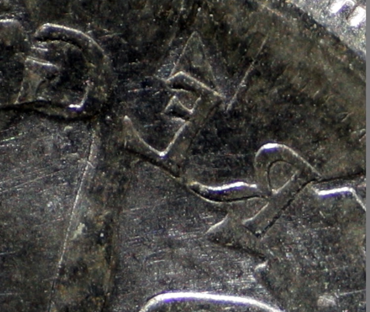 Is-This-1963-25-Cent-An-Error-Coin?-Or-A-Vise-Or-Hammer-Job?