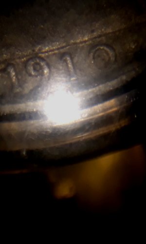 1910-Un-Peso-Mexican-Coin?