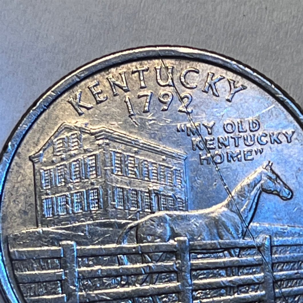 2001-Kentucky-Quarter-Error---Looks-Like-A-Rim-To-Rim-Die-Crack