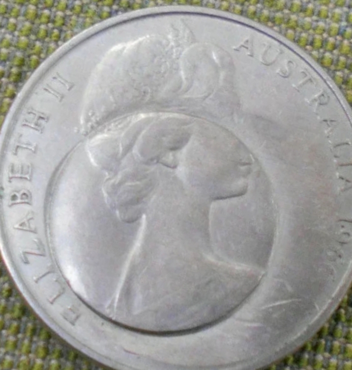 Identify-What-Could-Have-Caused-These-Stamps-On-Australian-1966-20c-Coin