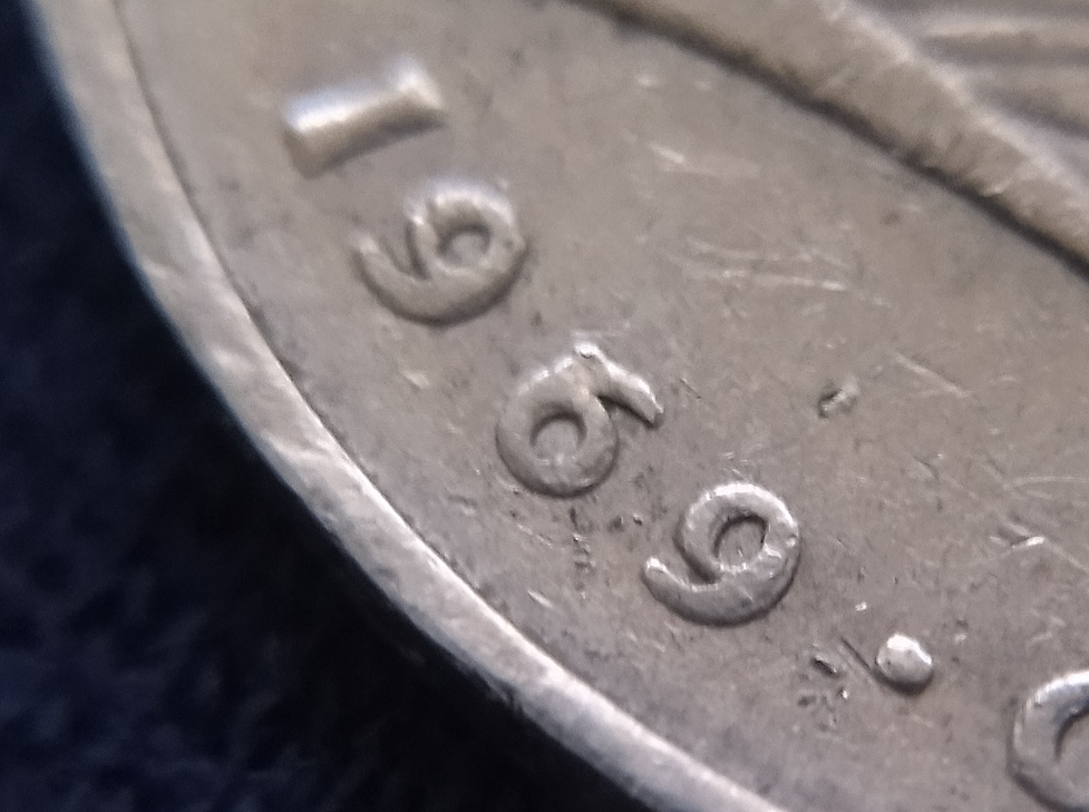 I-Have-A-Double-Date-On-This-2-Mark-Coin