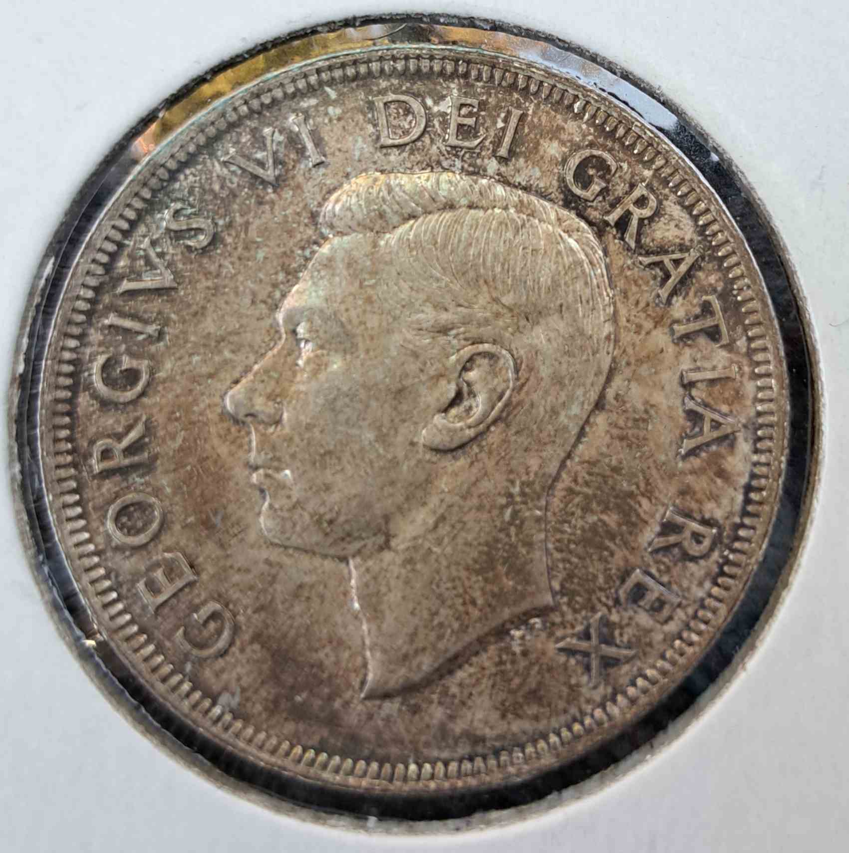 1949-Canadian-Silver-Dollar-Grade-It