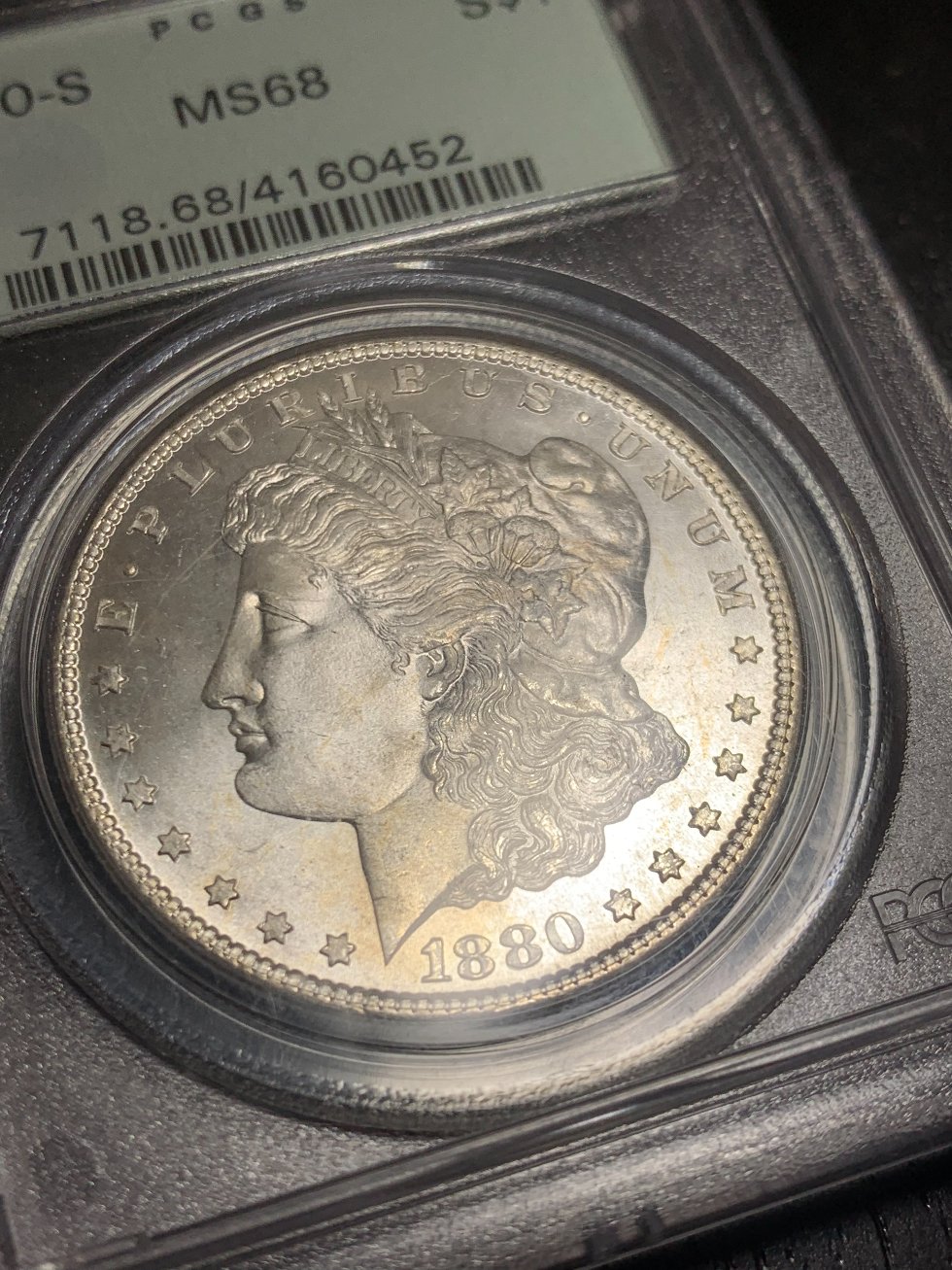 Showing-Off-A-New-Pickup.1880-S-Morgan-PCGS-MS-68-OGH