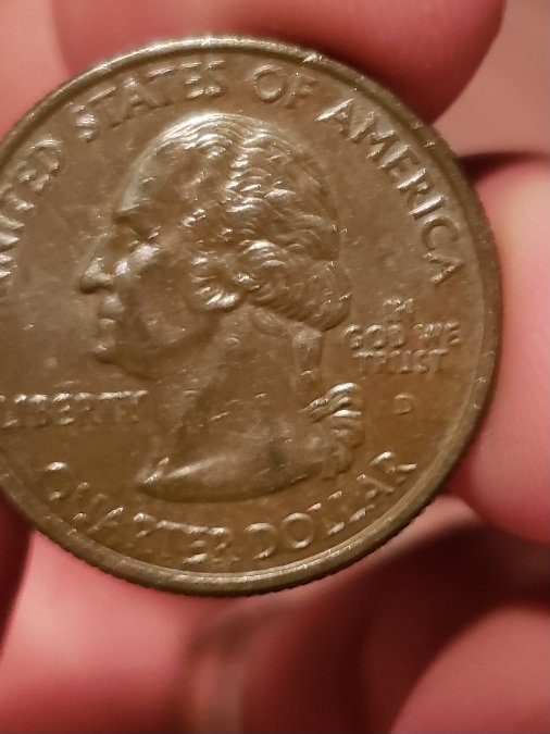Help,-2005-D-Kansas-Quarter-Odd-Color?
