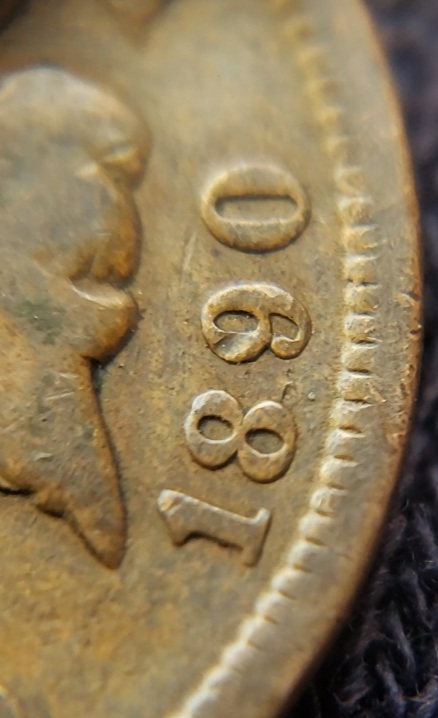 1890-Penny-With-Some-Sort-Over-Overlay-Can-Make-Out-A-7-And-A-Few-Others