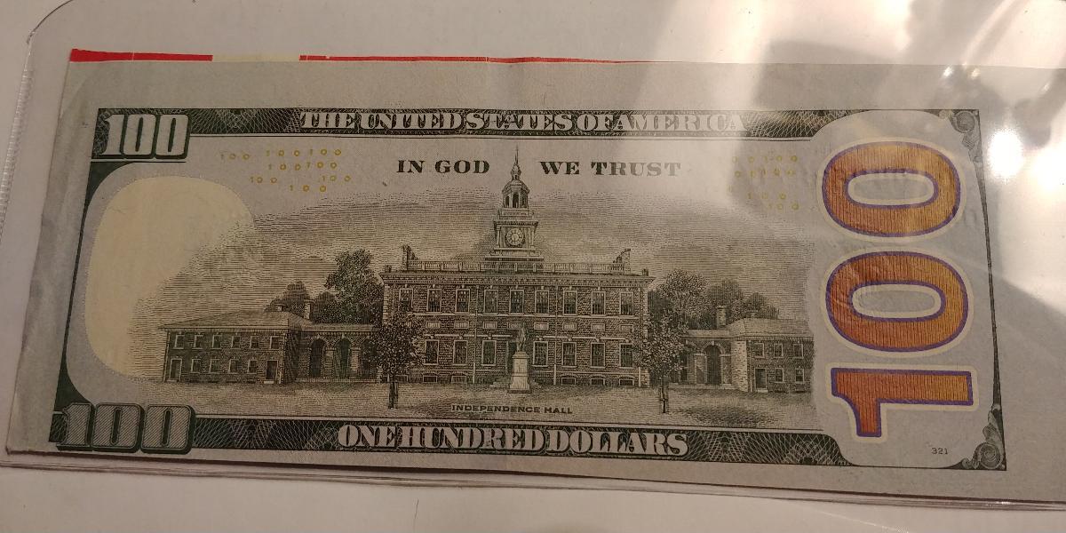 Horizontally-And-Vertically-Misaligned-100-Dollar-Bill