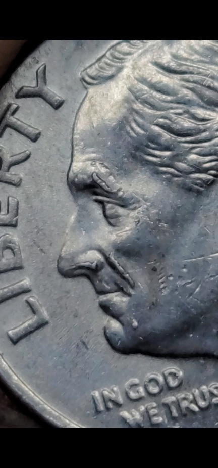 Roosevelt-Dime---New-To-Error-Collecting,-Not-Sure-What-This-Is-Called.