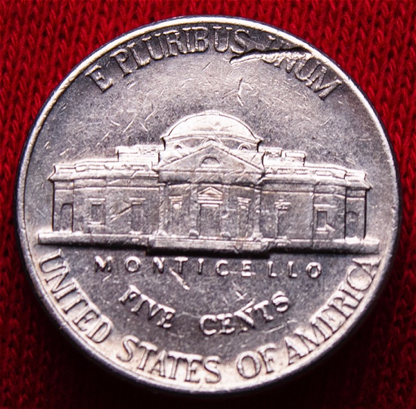 1994-P-Jefferson-Nickel-Struck-Thru-Somethig?