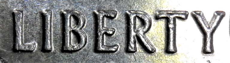 2002-W.quarter-Ohio-And-2018-W.quarter-Wiscosin.-Which-1-Is-DD-Or-None.-Helps-Please