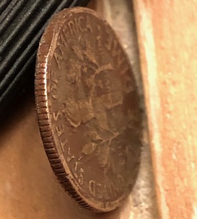 I-Have-A-1977-Dime-That-Has-Clips-On-Both-Sides