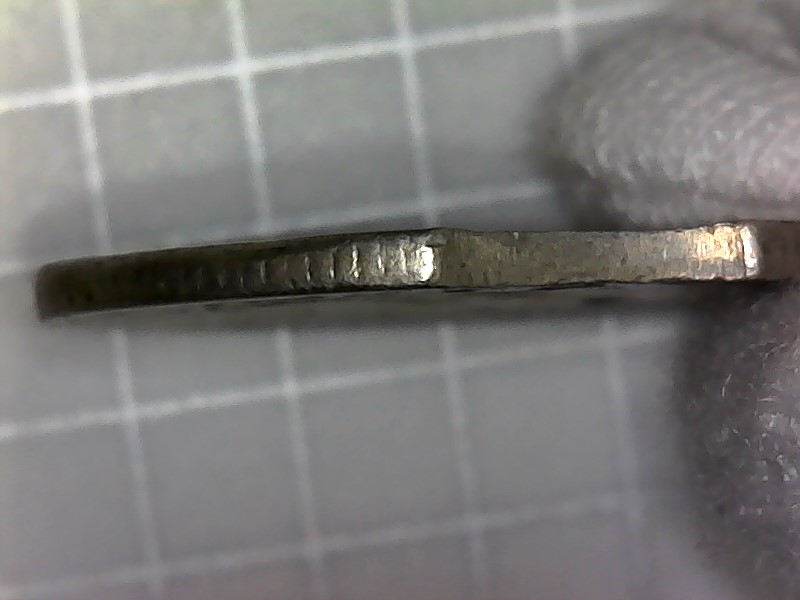 1965-Quarter-Clipped-Or-Cut-Planchet-Two-Places