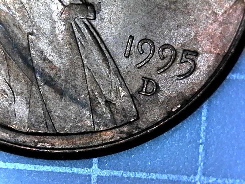 1995-D-Cent-With-Two-Raise-Areas-On-Lower-Jacket-And-Upside-Down-