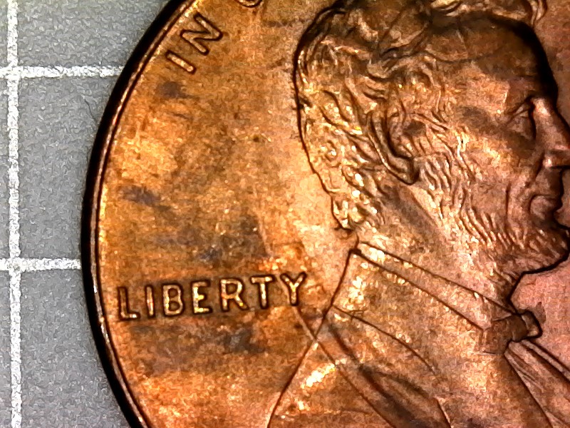 1995-D-Cent-With-Two-Raise-Areas-On-Lower-Jacket-And-Upside-Down-