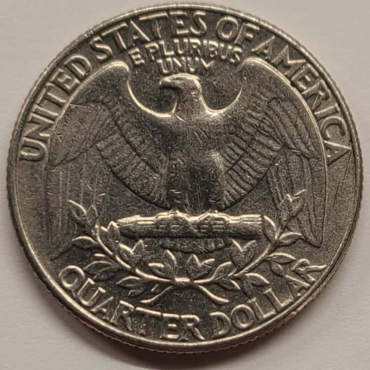 1990-P-Quarter---PMD-Broken-Wing?-Die-Chip?-Doubling?