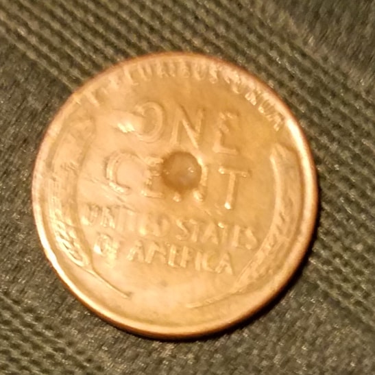1947-Lincoln-Penny-With-Perfect-Circle-On-Back