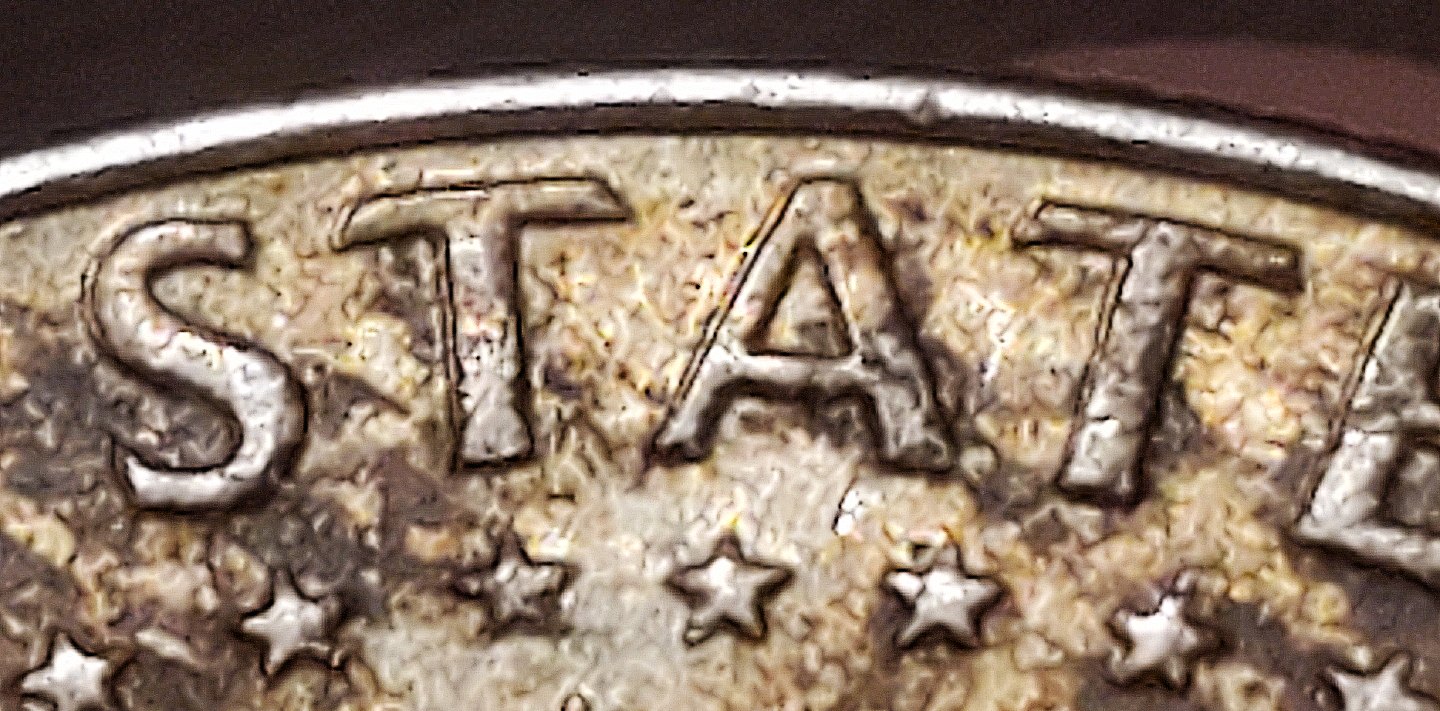 1966-Half-Dollar-Coin,-The-Reverse-Doubled-Letters?