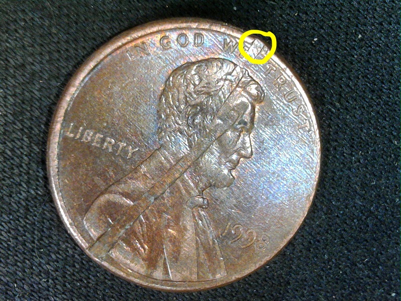 1998-P-Lincoln-Cent-With-Struck-Through-Planchet?-During-Blanking-Press?