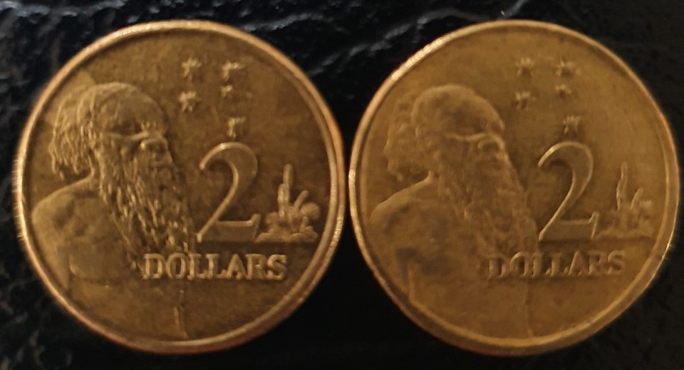 Need-Help-With-Two-$2-Dollar-Coins-With-Marks-On-Back.