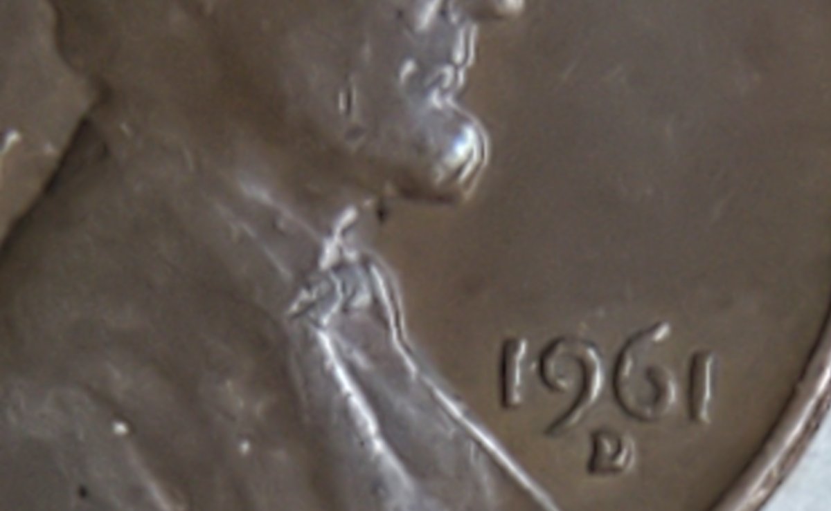 1961-D-Lincoln-Memorial-Cent,-Extra-Strip-Running-Down-East-Side-Of-Bust?