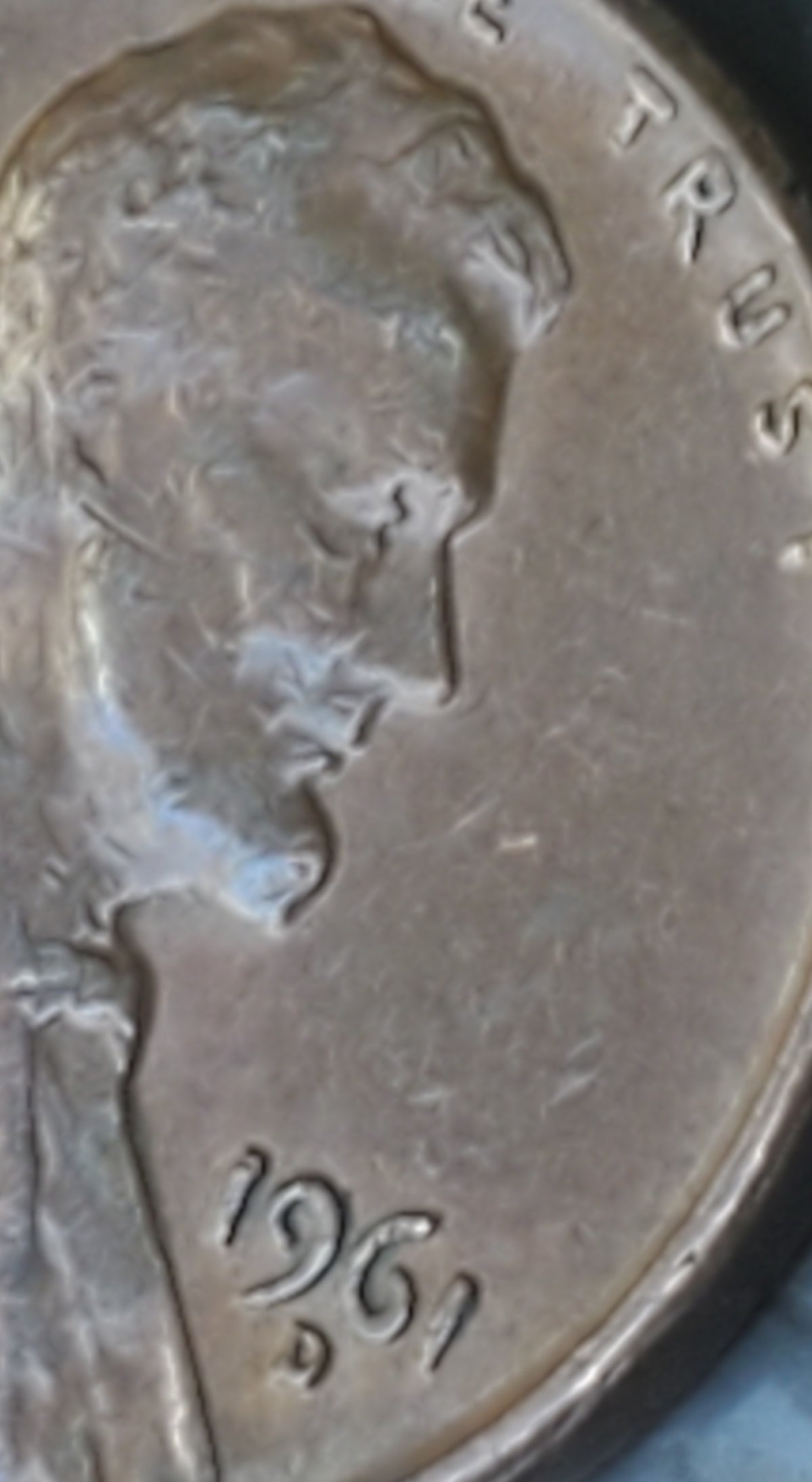1961-D-Lincoln-Memorial-Cent,-Extra-Strip-Running-Down-East-Side-Of-Bust?