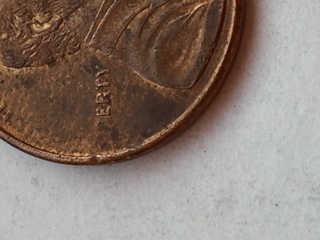 Over-Polished-Die/Struck-Through-Heavy-Grease-Cent-Error?