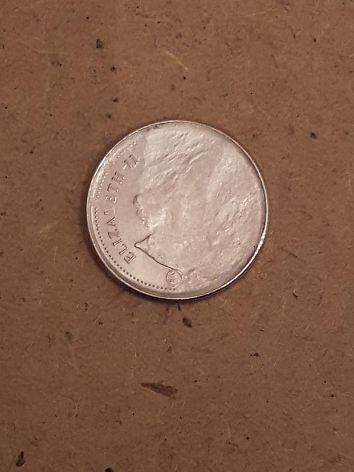 Value-Of-A-2007-Dime-With-Struck-Through-Grease