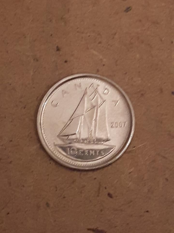 Value-Of-A-2007-Dime-With-Struck-Through-Grease
