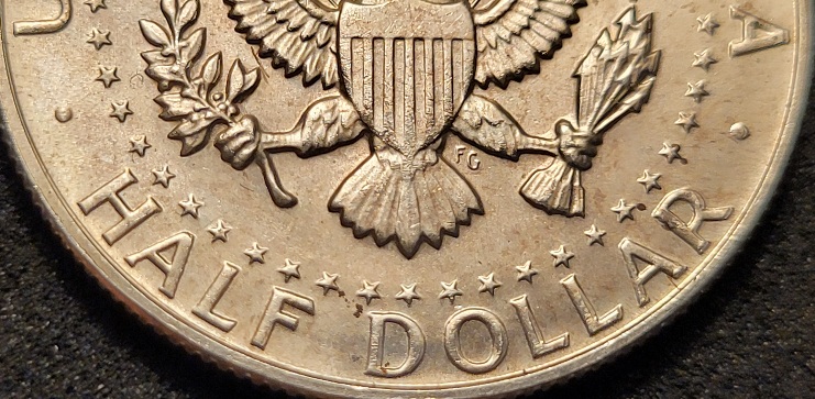 1968-D-Kennedy-Half-Dollar-With-MD-And-Something-Else.