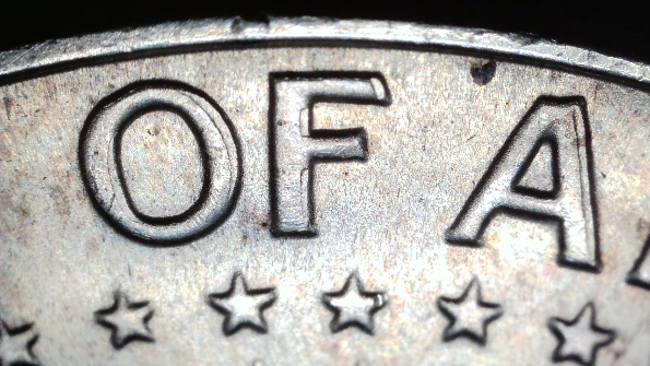 1968-D-Kennedy-Half-Dollar-With-MD-And-Something-Else.