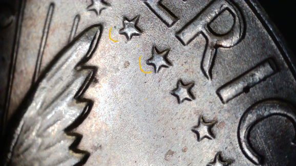 1968-D-Kennedy-Half-Dollar-With-MD-And-Something-Else.