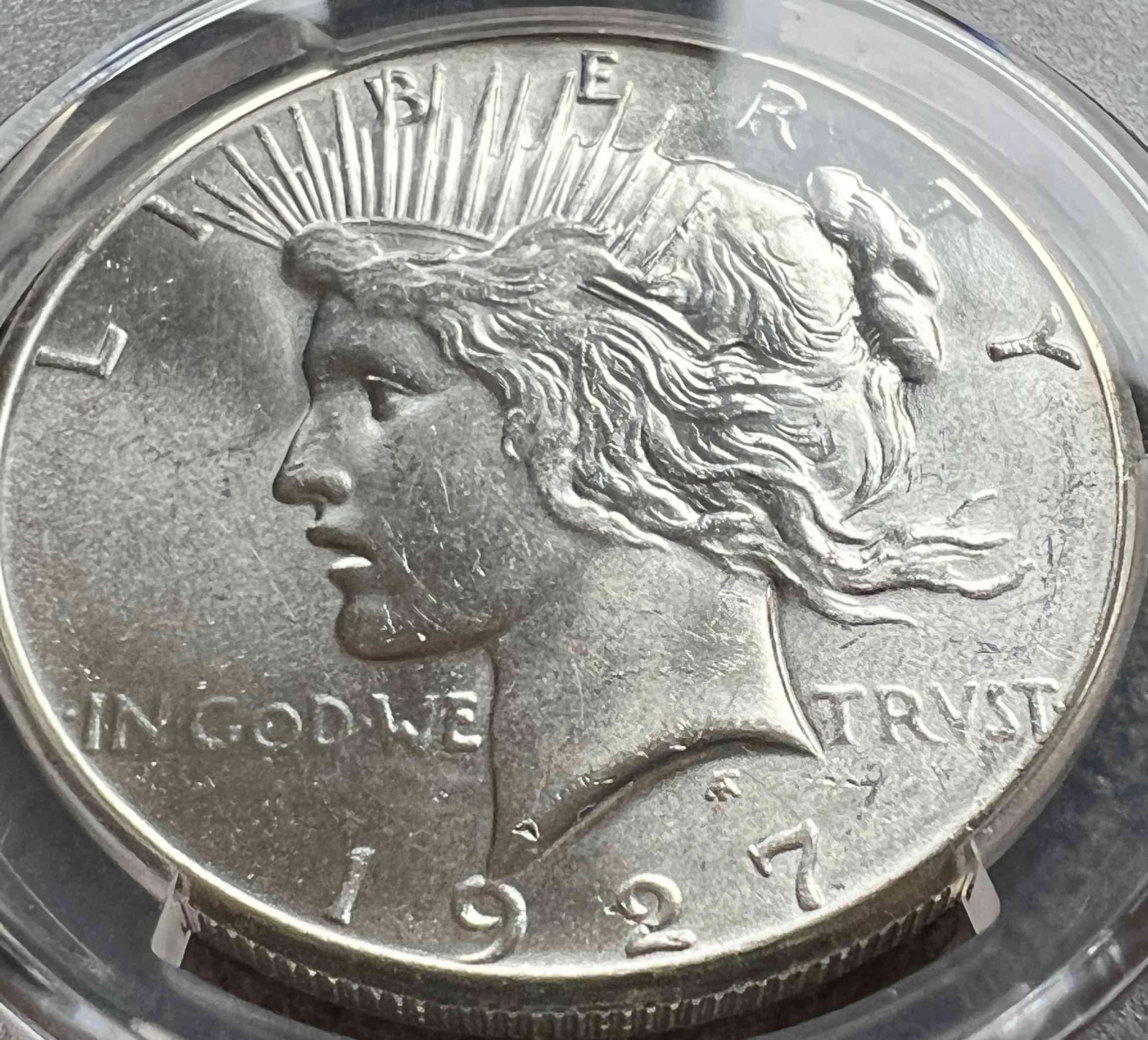 You-Vs-PCGS---1927-P-Peace-Dollar