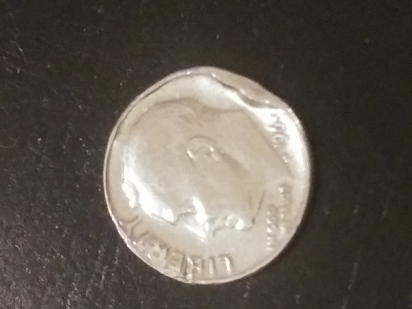 1965-Dime-Error-Or-Damage?