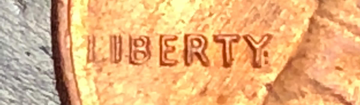 1984-LMC-Half-Of-L-In-Liberty-Missing.